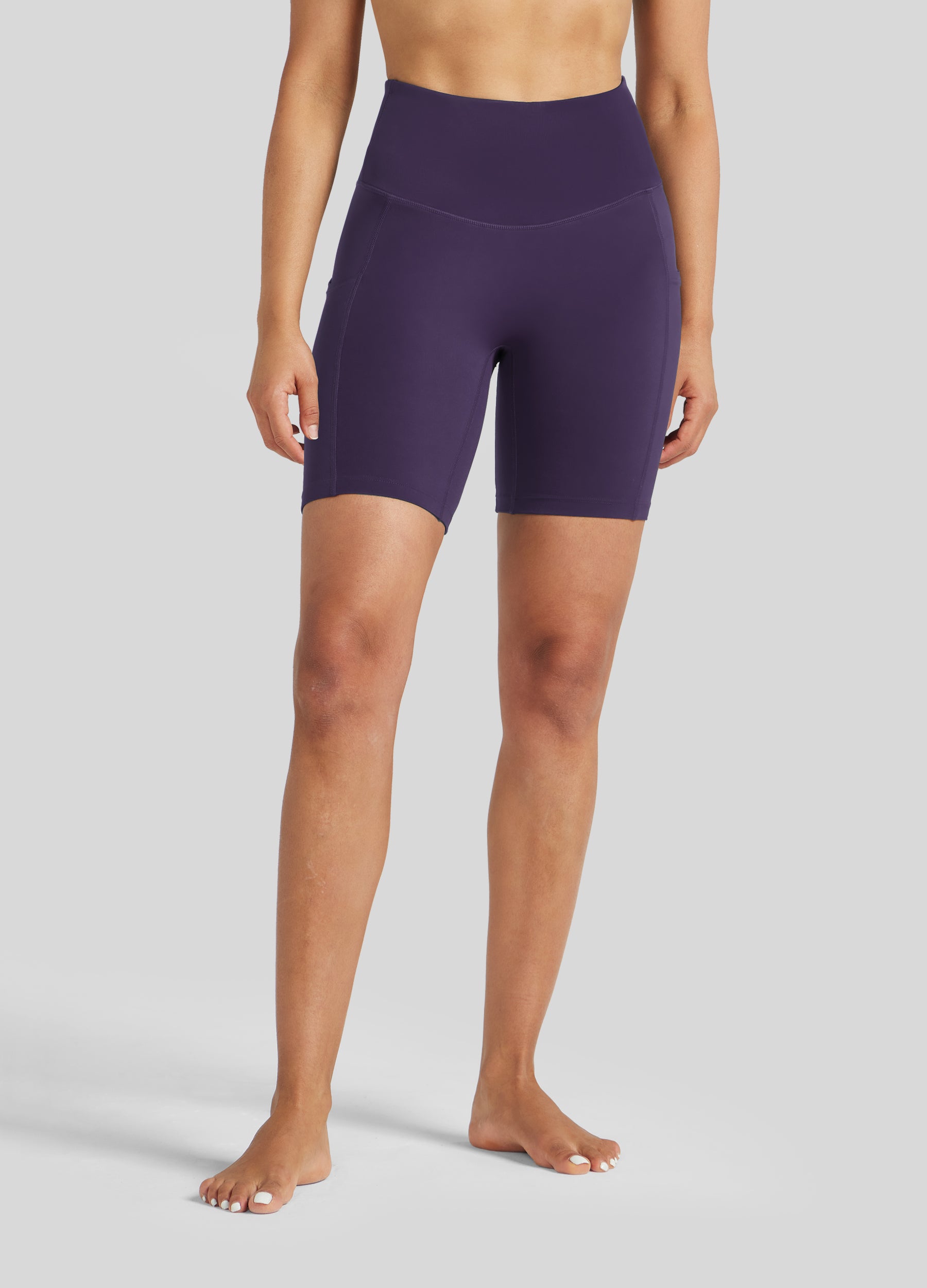 Womens Yoga Shorts with Pockets 7 Inch deep purple